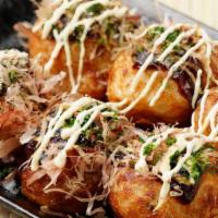 Takoyaki (6Pc) · Battered octopus with mayonnaise, okonomiyaki sauce, fresh cut green onion and smoked bonito...