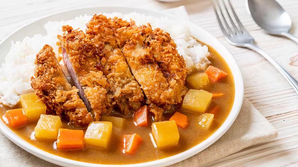 Curry Chicken Katsu · Golden fried chicken breast in pankos, topped with katsu curry and served with rice.