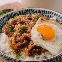 Gyudon (Beef Bowl) · Thinly sliced beef and onions cooked in a sweet soy based sauce and served on rice with one ...