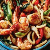 Seafood Udon · Udon noodles stir fried with shrimp, scallop, imitation crab meat and vegetables.