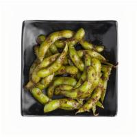 Garlic Edamame · Steamed soybeans tossed in garlic, butter & soy sauce