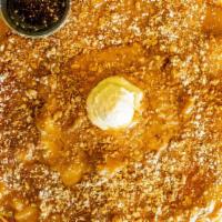 Caramel Apple Hot Cake · Buttermilk pancake, cinnamon butter slow roasted apples, granola, caramel sauce, powdered su...