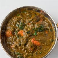 Tikka Saag · Tandoori-style chicken or lamb, served in curry of creamed chopped spinach, sauteed diced on...