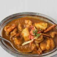 Arvi Curry · Traditional Bengali dish made of boiled peeled taro cut into chunks and served in an onion-b...