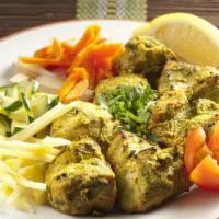 Ginger Chicken · Boneless chicken breast marinated in delicate herbs and freshly ground spices and roasted in...