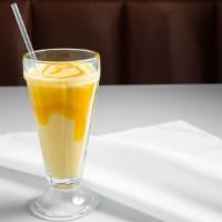 Mango Lassi · A refreshing drink made with yogurt and mango; smooth, creamy, and absolutely heavenly.