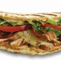 Chipotle Chicken Club · Grilled chicken, bacon, romaine, tomatoes, pepper jack & chipotle mayo on a toasted flatbread.