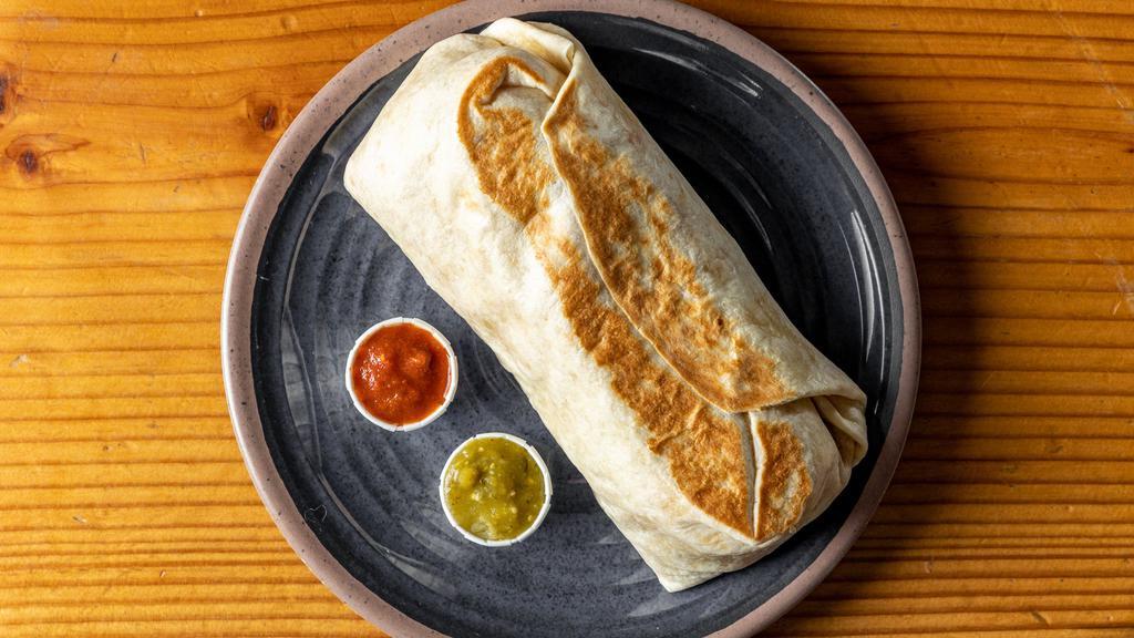 Black Bean Burrito · Stewed black beans, basmati rice, Mexican cheese blend, cabbage slaw, verde, and plantain sauce, served in a flour tortilla with tomatillo and ranchero salsa.