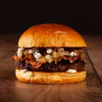 The Bacon Blue Cheese Burger · Beef patty, bacon, caramelized onions, mayo, and blue cheese on a brioche bun.