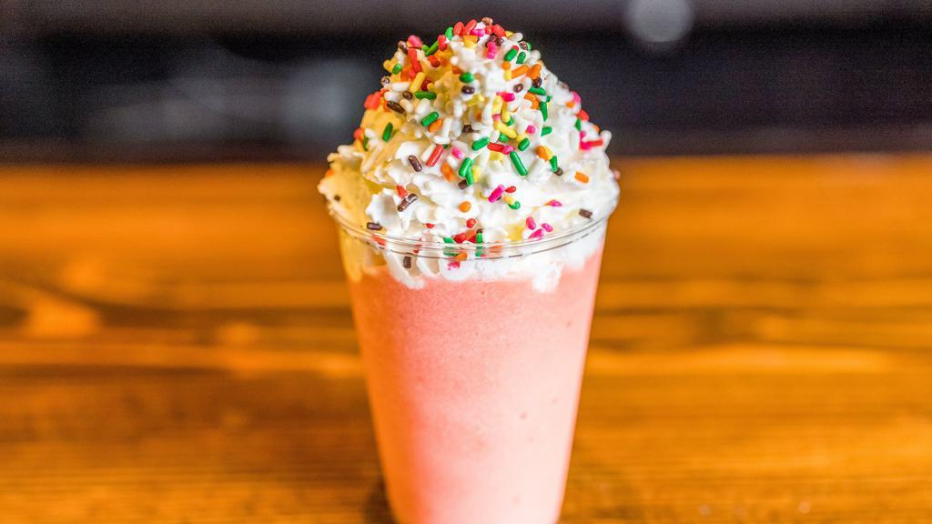Kids Fruit Smoothie · Kids fruit smoothie. Made with real fruit purre and topped with whipped cream and spinkles.