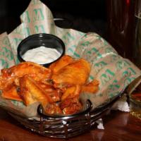 Fowl Flappers - 16 Wings · Your choice of dipping sauces:: BBQ, classic hot, Thai chile, raspberry chipotle