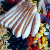 Southwest Salad · chopped romaine lettuce, grilled chicken, cheddar cheese, tortilla strips, roasted corn, tom...
