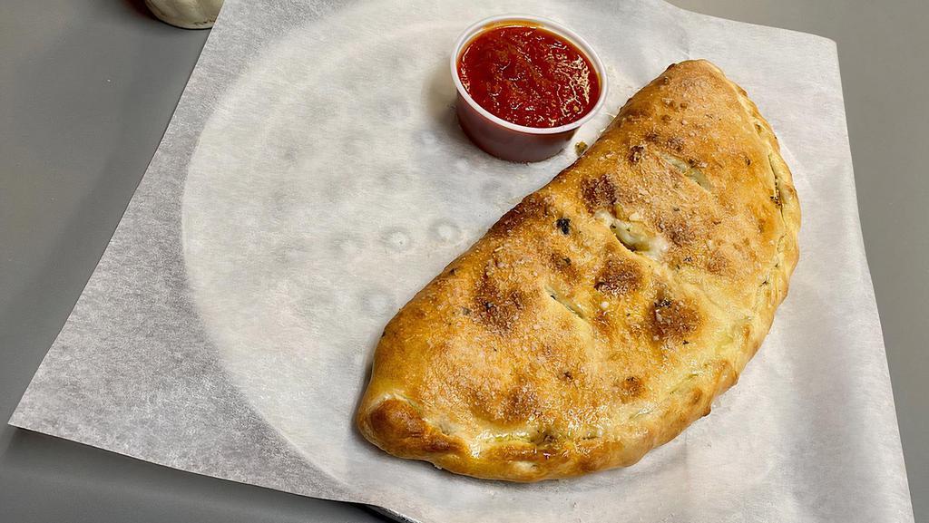Calzone · Mozzarella & ricotta with a side of our house-made marinara.
