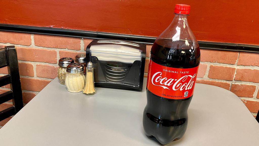 Soda (2 Liter) · Nothing like a cold soda to go with your pizza.