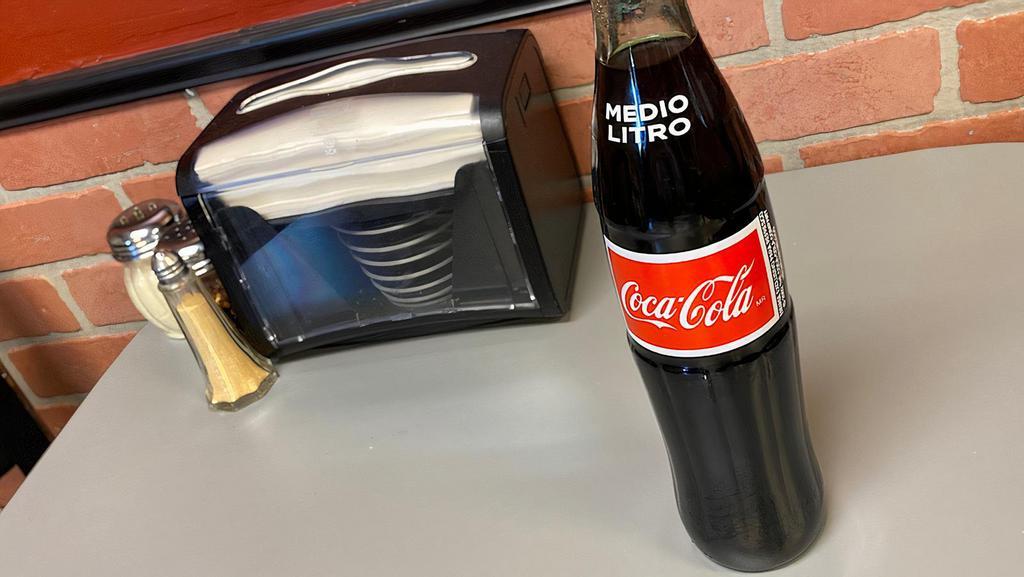 Soda (Bottled) · Nothing like a cold soda to go with your pizza.