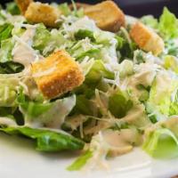Caesar Salad  · Chopped romaine, white anchovies, house croutons, caesar dressing, and parmesan crisp.