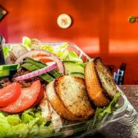 Tubs Cobb Salad · Romaine, cucumbers, tomato, dill-seasoned chicken, bacon, sliced avocado and red onions. Ser...