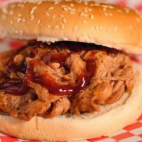 Bbq Pork Sandwich · Slow smoked and lightly sauced.