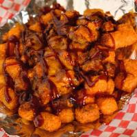 Bbq Brisket Loaded Tots · Tots topped with BBQ Beef Brisket, BBQ sauce and shredded cheddar