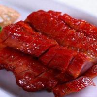 Bbq Pork · Long strips of seasoned boneless pork.