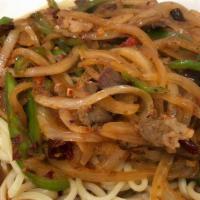 Spicy Cumin Beef Dry Noodles孜然牛肉面 · Spicy. Shredded beef stir-fried with cumin, onion and jalapeno peppers served on top of dry ...