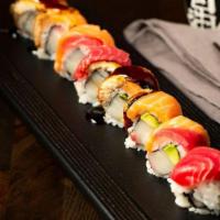 Fremont Roll · In: hamachi avocado top: tuna salmon ungai (tuna/salmon/unagi/tuna/salmon/unagi) unagi sauce...