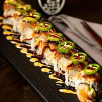 American Roll · In: tempura crab mix avocado top: spicy tuna unagi spicy mayo unagi sauce jalapeno slice