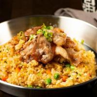 Pork Belly Fried Rice · Pea carrot green bean egg and marinated pork pork belly on top.