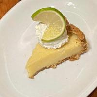 Key Lime Pie · Graham Cracker Crust, Nellie & Joe's Famous Key Lime Juice, Fresh Whipped Cream