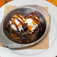 Flourless Chocolate Brownie Sundae · Salted Caramel, Chocolate sauce, Vanilla Bean Ice Cream, Candied Walnuts, Whipped Cream