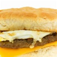 The Breakfast Sandwiches · Your choice of bacon, ham or sausage with delicious cheesy eggs