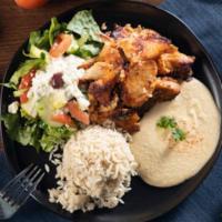 Chicken Shawarma Plate · Grilled Marinated chicken with Lebanese spices served with hummus, rice, tzatziki sauce and ...