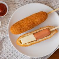 Seoul Half And Half Hot Dog · Half cheese half sausage covered with panko.