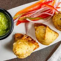 Samosa · Nut free, vegan. 2 pcs of potatoes with green peas, mildly seasoned with spices. Vegan and n...