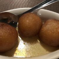 Gulab Jamun · 2 pc of Fried milk rounds soaked in sugar syrup.