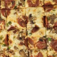 Classic Combo Pizza · Sausage, Olives - Black, Pepperoni, Green Peppers, Onions and Mushrooms.