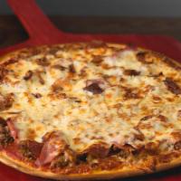Meat Classic Pizza · Pizza Sauce, Pizza Cheese, Canadian Bacon, Beef - Ground, Italian Sausage and Pepperoni.