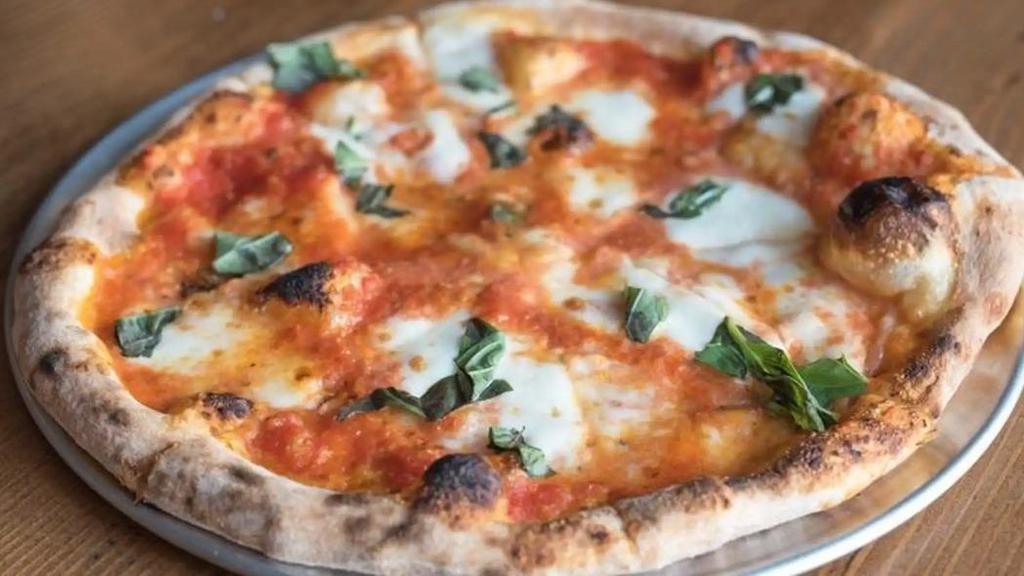 Margherita Pizza · tomato sauce, fresh mozzarella, fresh basil
