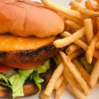 Vegan Impossible Burger (4Oz) · lettuce, tomato, vegan cheddar, vegan aioli served with fries