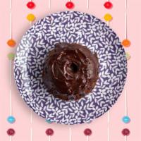 Chocolate Officer · Chocolate cupcake with chocolate chips, chocolate frosting topped with more chocolate chips.