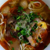 Hue Beef Noodle Soup · A regional specialty composing thick rice vermicelli and various toppings in the beef soup e...