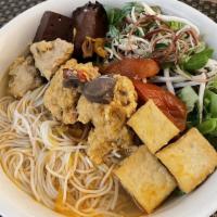 Crab Noodle Soup  · Rice vermicelli noodles drowned in savory chicken broth with tomato and unami-packed crab, s...