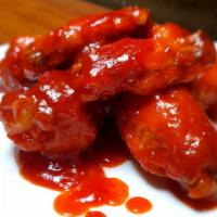 Hot Wings · Crispy chicken wings tossed with sweet& hot sauce.