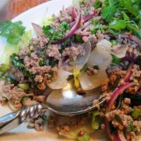 Larb · Choice of protein, tossed with roasted rice powder, onions, cilantro, mint and fresh lime ju...