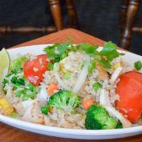Fried Rice · Rice stir-fried with your choice of meat, seefood, or tofu, peas, carrots, broccoli, onions,...