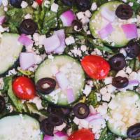 The Greek Salad · Romaine, feta cheese, pesto, olives, onions, cucumber, tomato, lemon juice, salt, pepper, an...