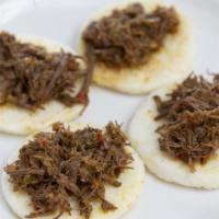 Arepas With (Order Of 4 People) · Gluten-free Colombian corn-cake. Served with any meat. Chorizo, chicharron, morcilla, shredd...