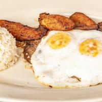 Bistec A Caballo · Skirt steak marinated and grilled to perfection, sautéed onions and tomatoes with two eggs o...