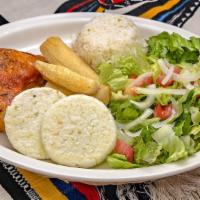 Pollo Asado · Is a quarter of a roast chicken, served with yuca frita, arepas and rice.