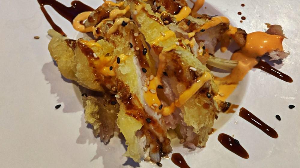 Vegetable Tempura (App) · Buttered fried vegetable tempura with tempura sauce.